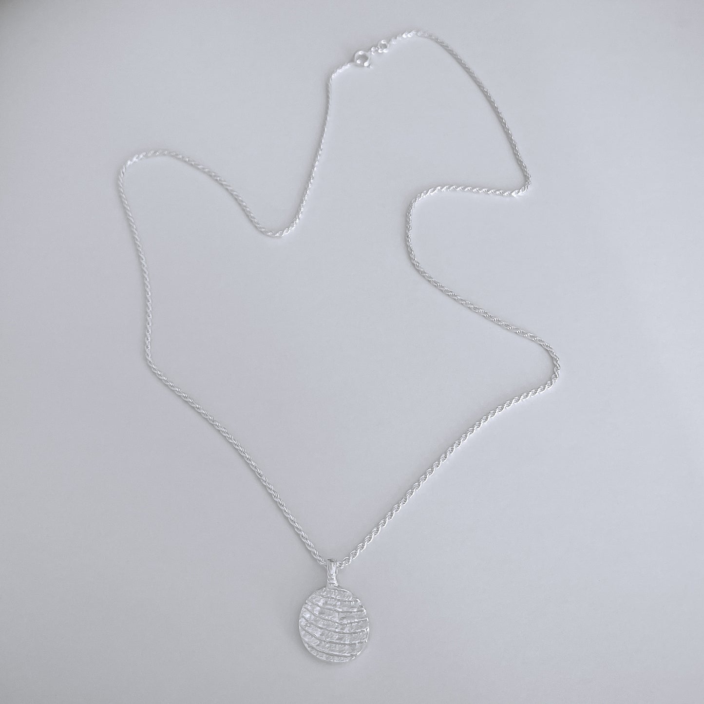 FLOW MEDALLION