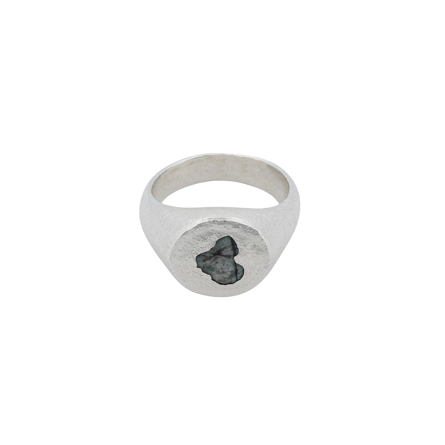 Sterling silver circle signet ring featuring a raw emerald gemstone, product shot