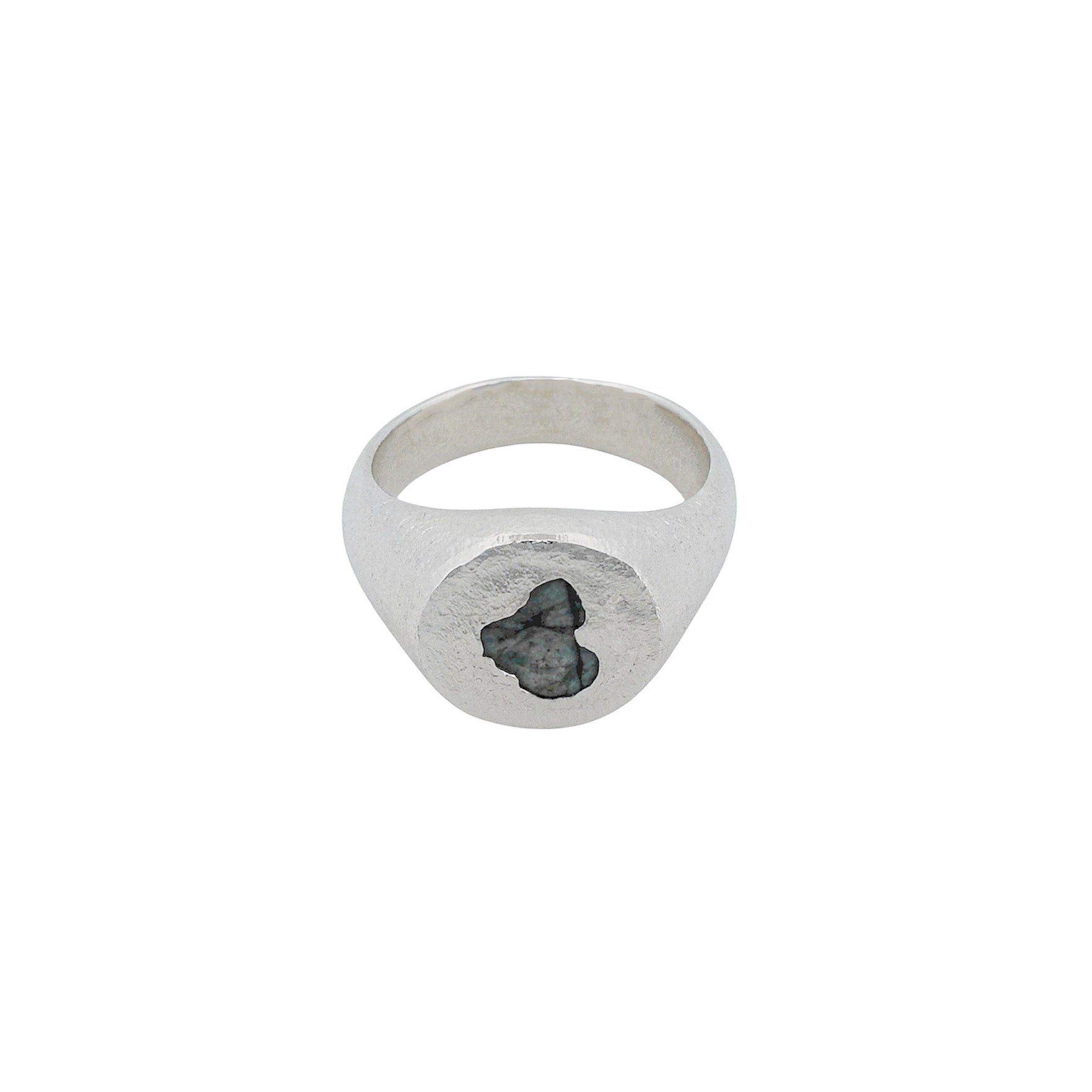 Sterling silver circle signet ring featuring a raw emerald gemstone, product shot