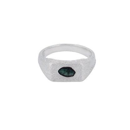 Product shot of sterling silver signet with centered rose-cut emerald