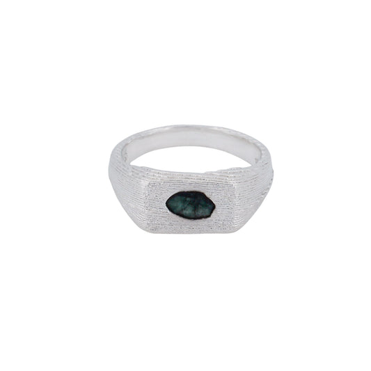 Product shot of sterling silver signet with centered rose-cut emerald