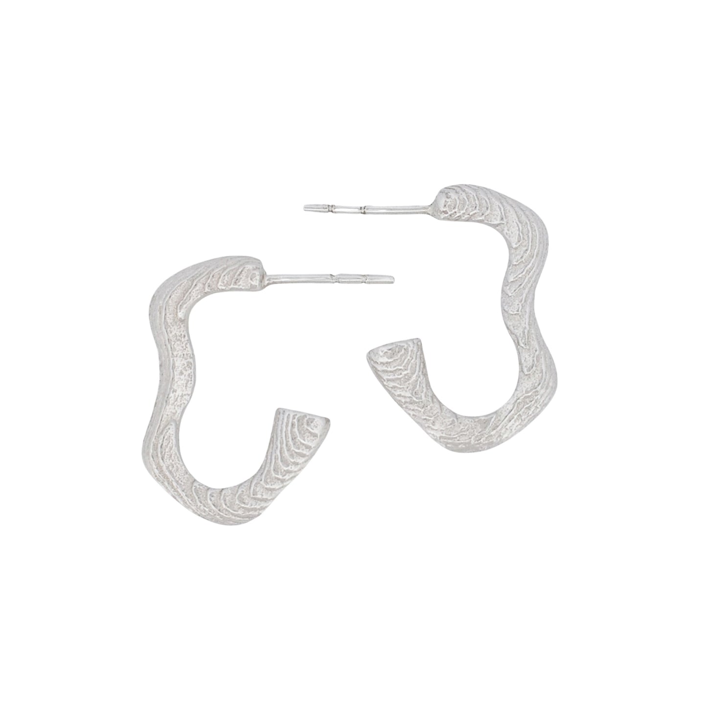 Sterling silver hoop earrings with a textured squiggle design, created using cuttlefish-cast technique, displayed on a plain background