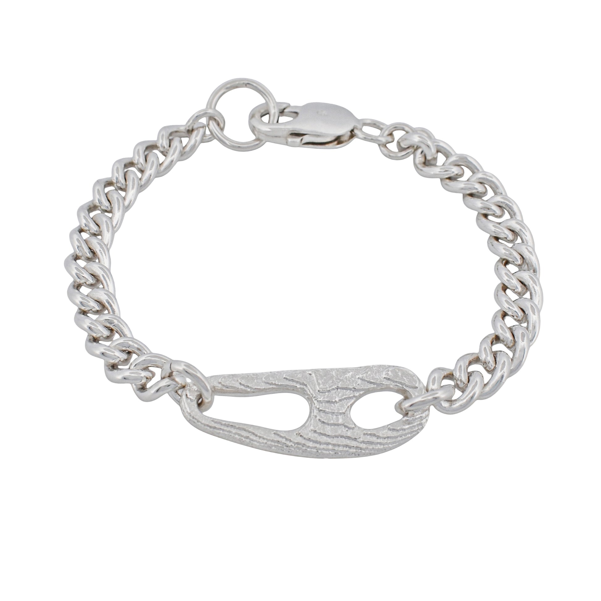 Ethically and consciously crafted from 100% recycled solid sterling silver.

Handcrafted in cuttlebone, featuring an irregular, open sculptural link.