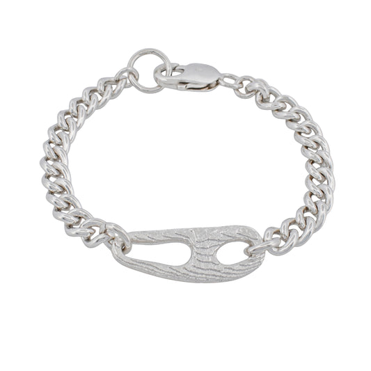 Ethically and consciously crafted from 100% recycled solid sterling silver.

Handcrafted in cuttlebone, featuring an irregular, open sculptural link.